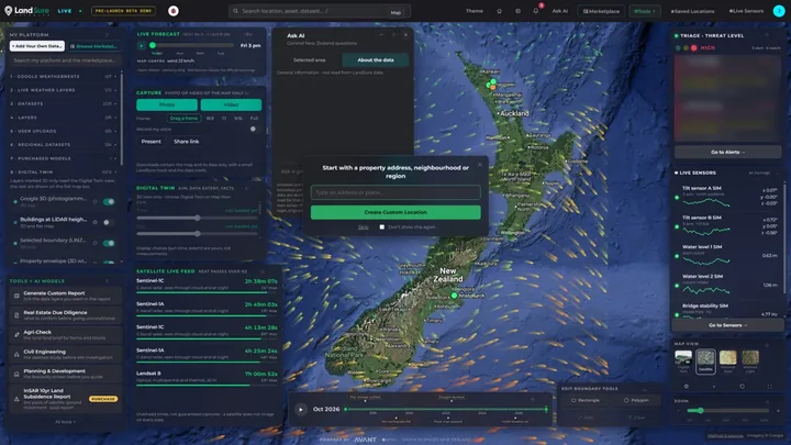 LandSure LIVE map platform showing New Zealand with weather, satellite pass times and data layer panels